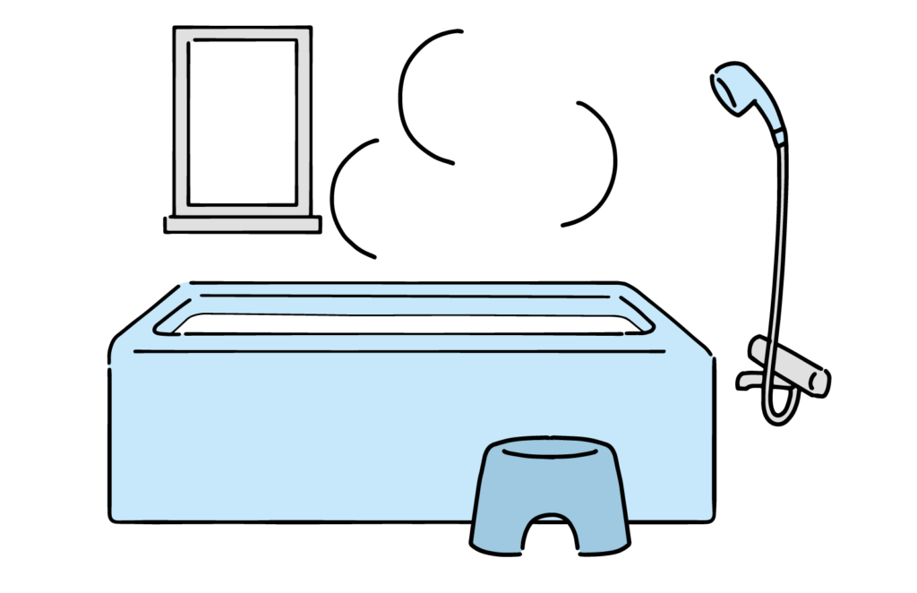 Blue sewing machine on a table with a curved lamp to the right and a small picture frame on the wall behind.